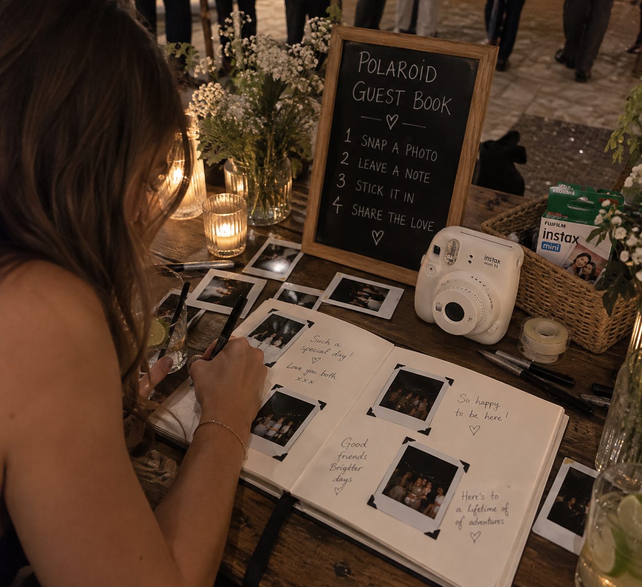 Guest writing in the Instax guest book