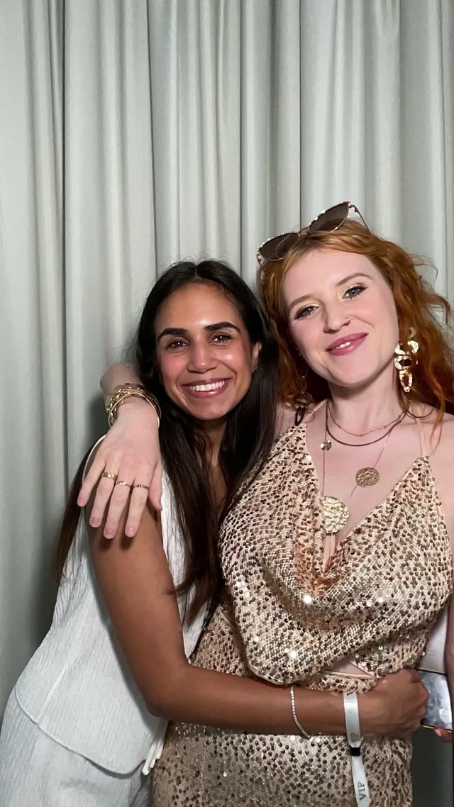 Friends hugging in the photo booth